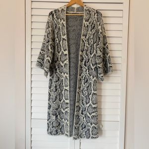 Do everything in Love duster sweater.